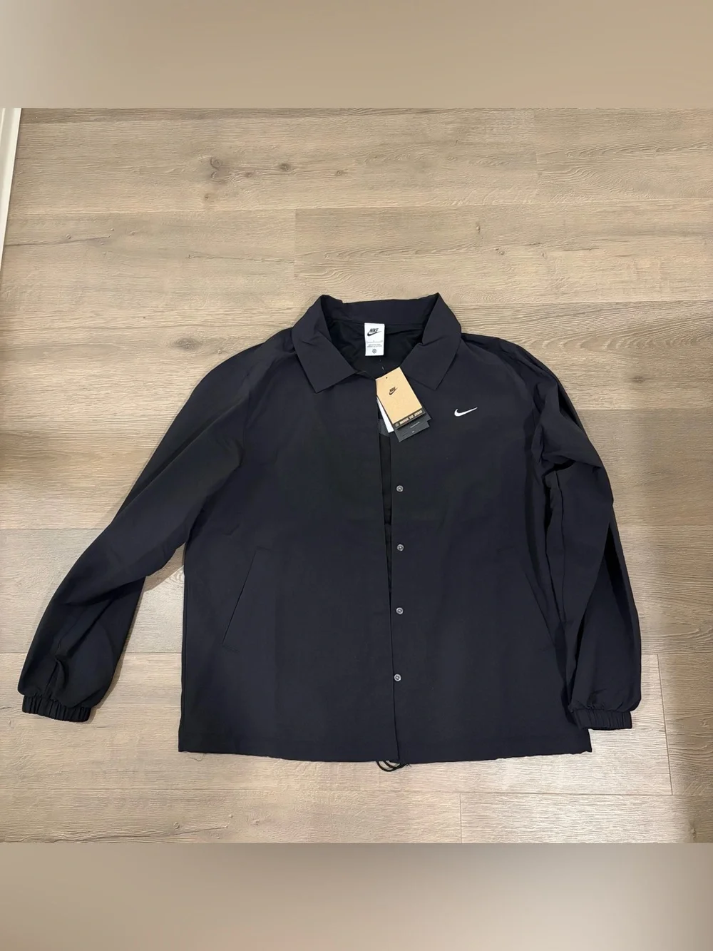 Nike Women’s Black Coach Jacket with Swoosh